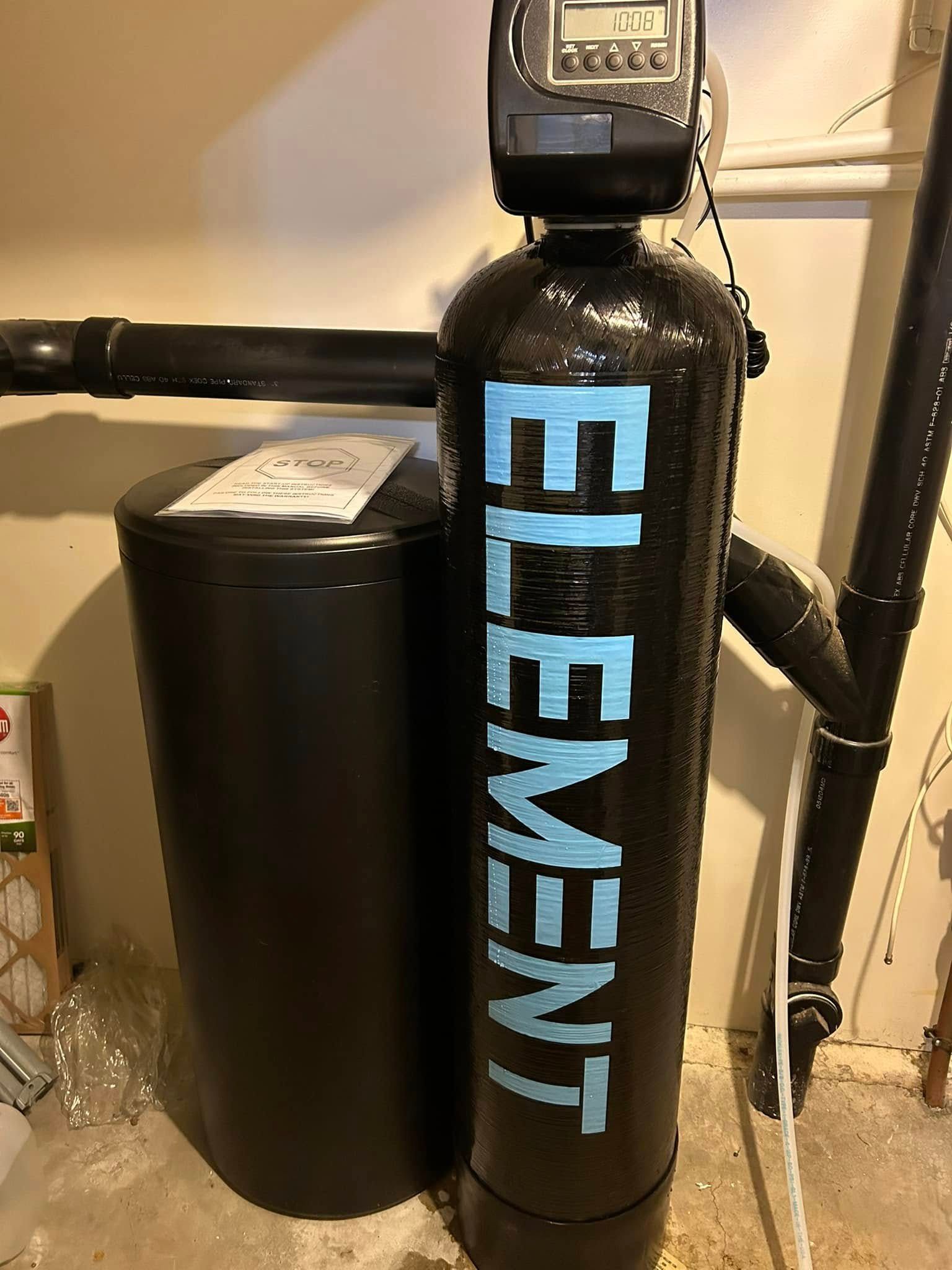 Water softener system with black tanks, digital display, and 