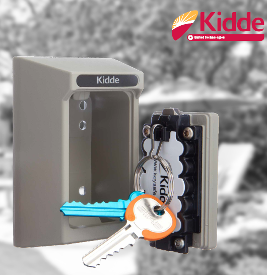 A beige Kidde key safe with a blue and orange key partially inserted — East Coast Locksmiths in Port Macquarie, NSW