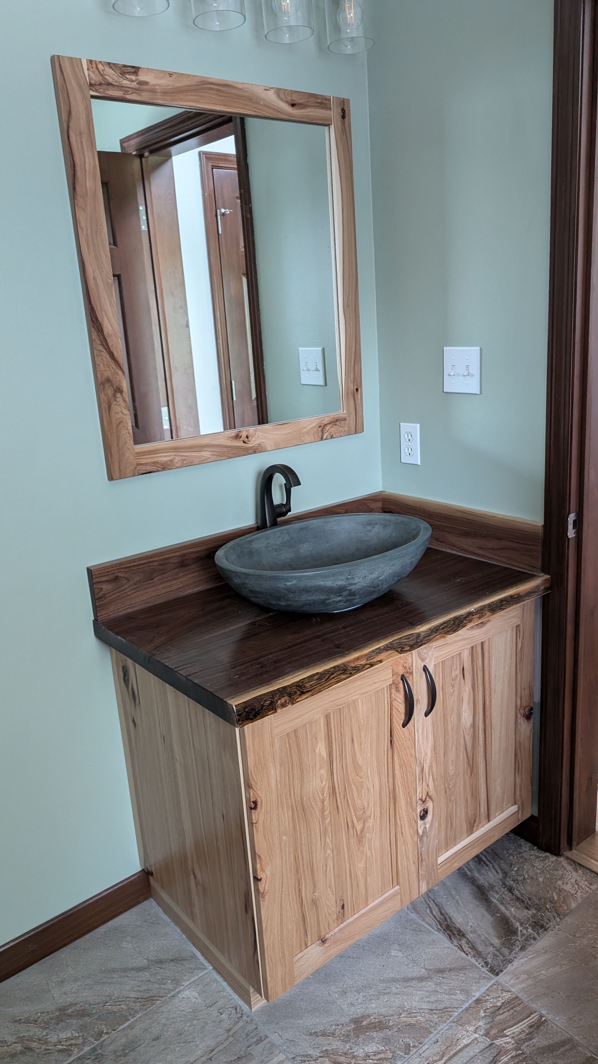 A  custom bathroom vanity and shower