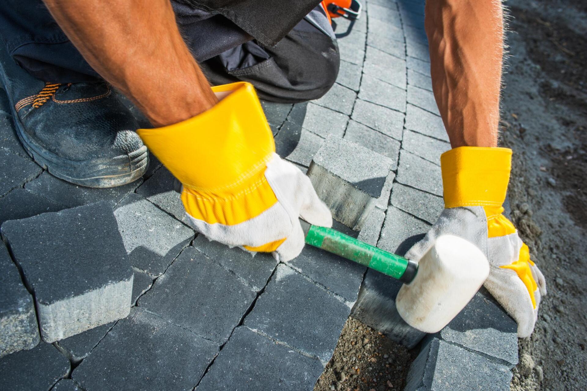 worker using a hammer
