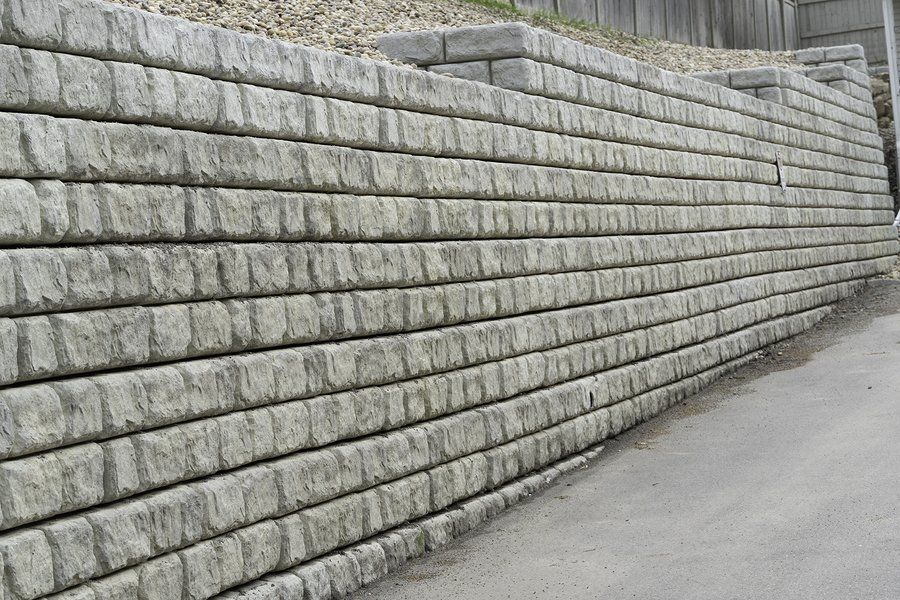 concrete walls beside the walkway