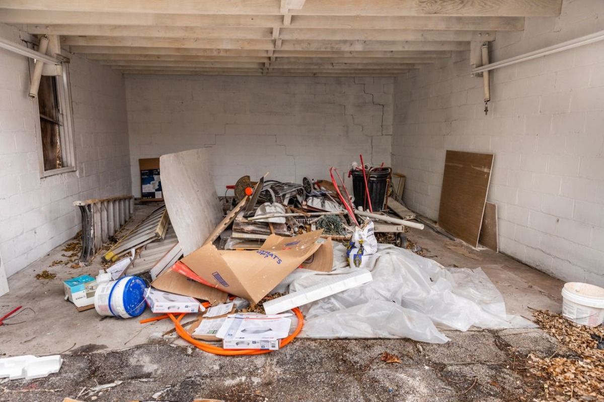 There is a lot of trash in the garage.