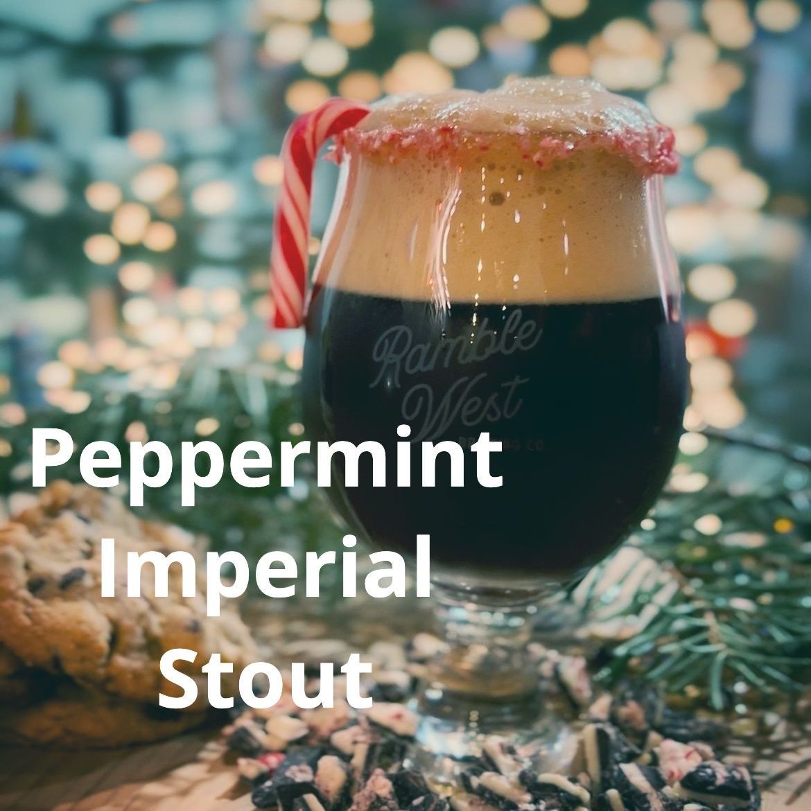 A glass of peppermint imperial stout with a candy cane on top