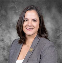 School Board President Katie Baudouin