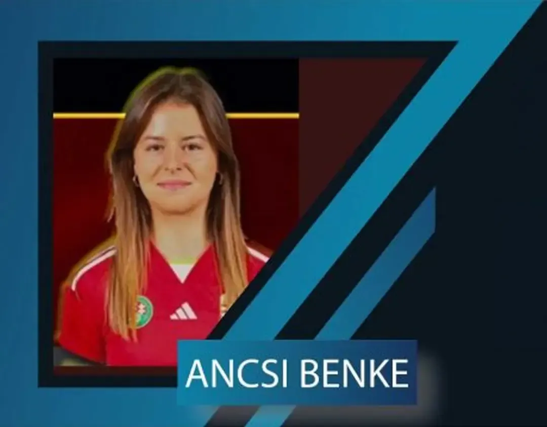 A headshot of Ancsi Benke in a red adidas shirt