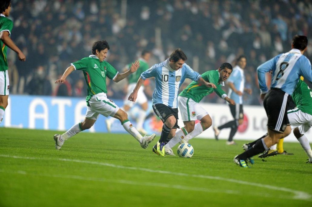 Argentina mens professional team playing soccer against Bolivia's professional soccer team