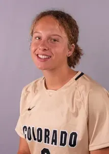 Ava Priest poses for her college headshot photo in a University of Colorado jersey