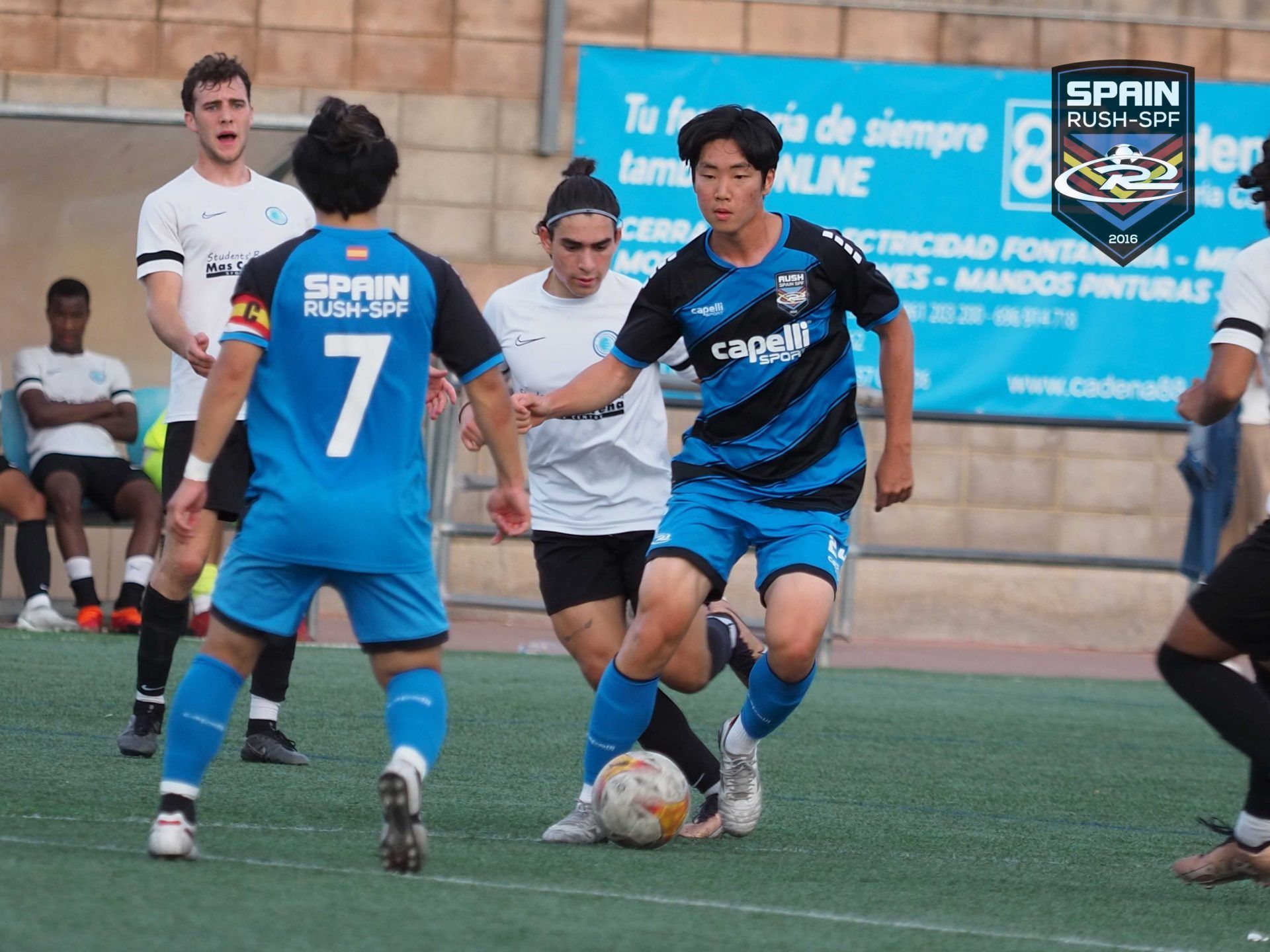 A soccer player with the number 7 on his back