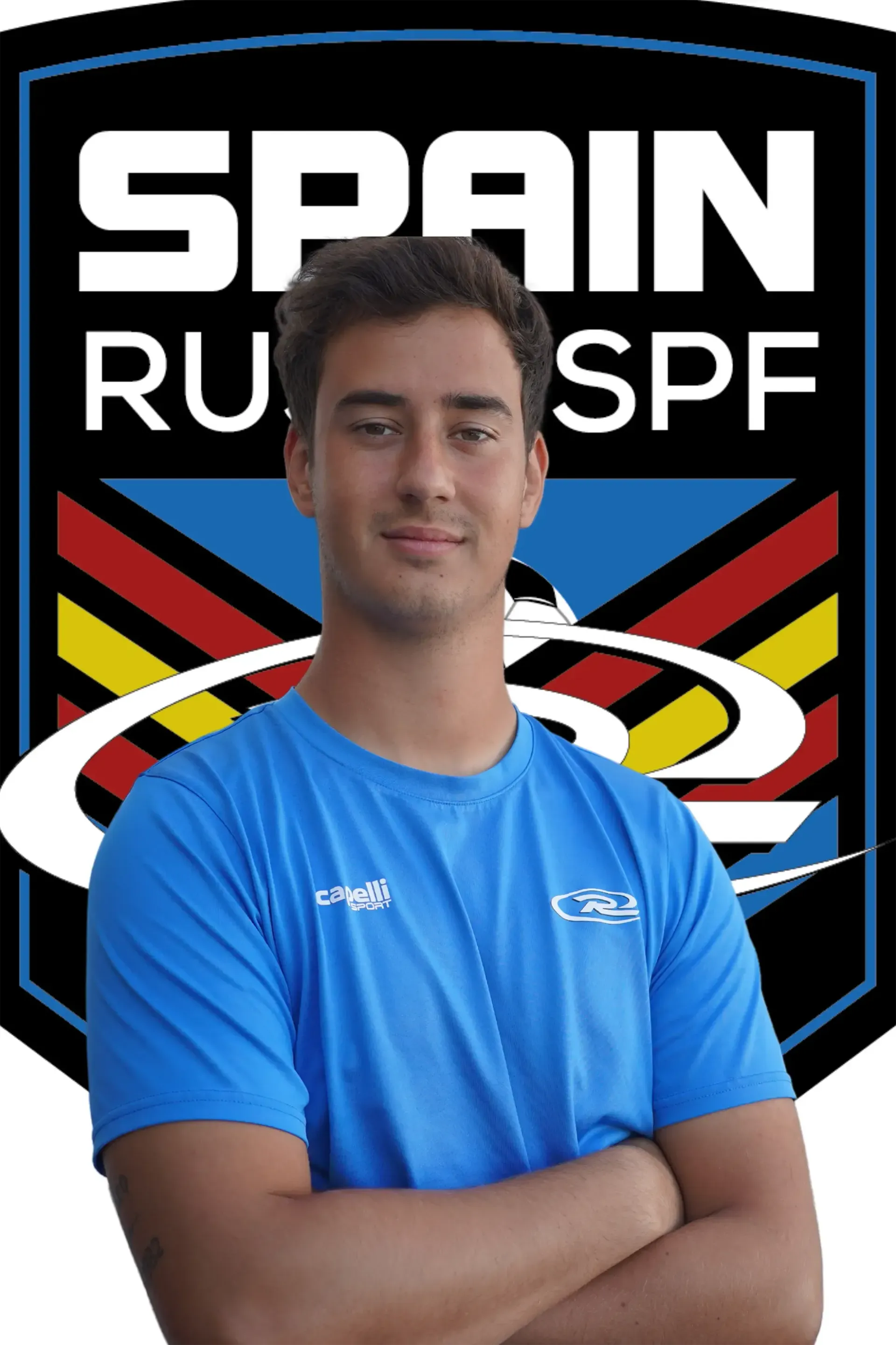 Hugo Garcia in a blue shirt is standing in front of a  Spain Rush-SPF logo