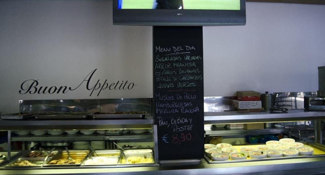 A chalkboard with the words buon appetito written on it