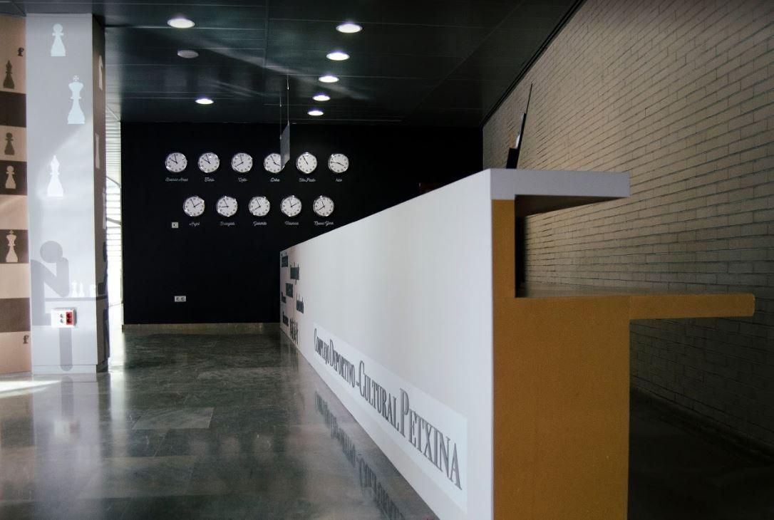 A long white counter with the word chess on it