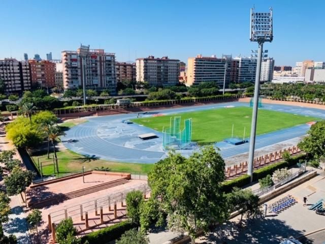 An aerial view of a stadium in a city