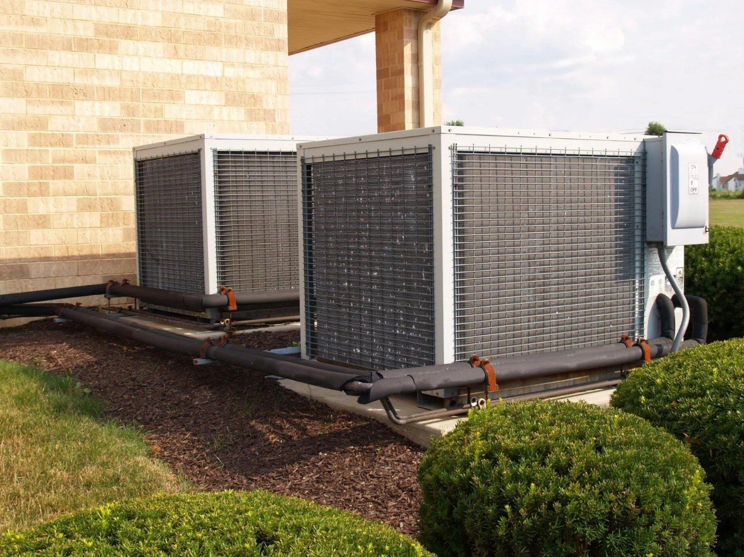 a pair of exterior heat pump units
