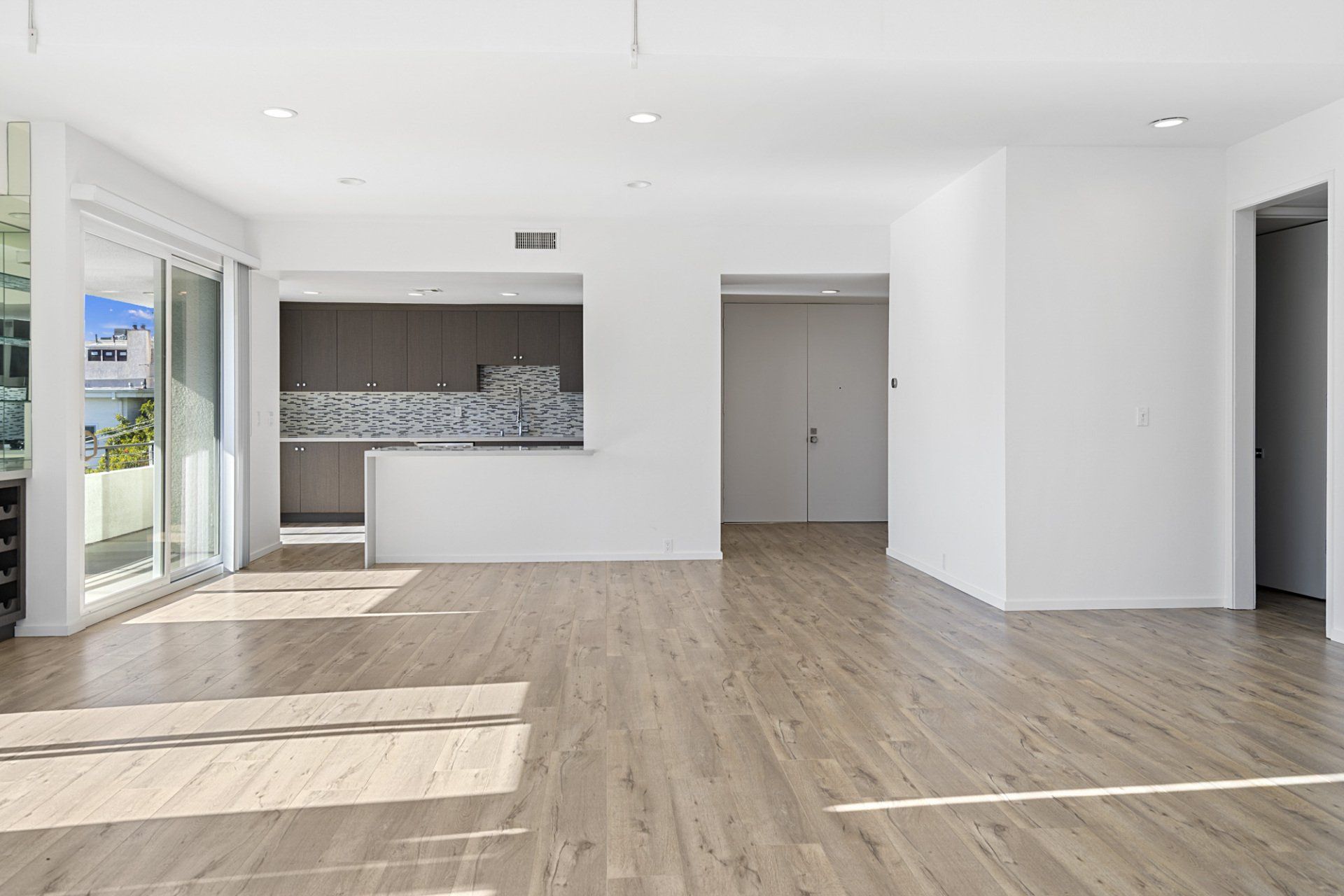 Interior view of kitchen and entry way hallway