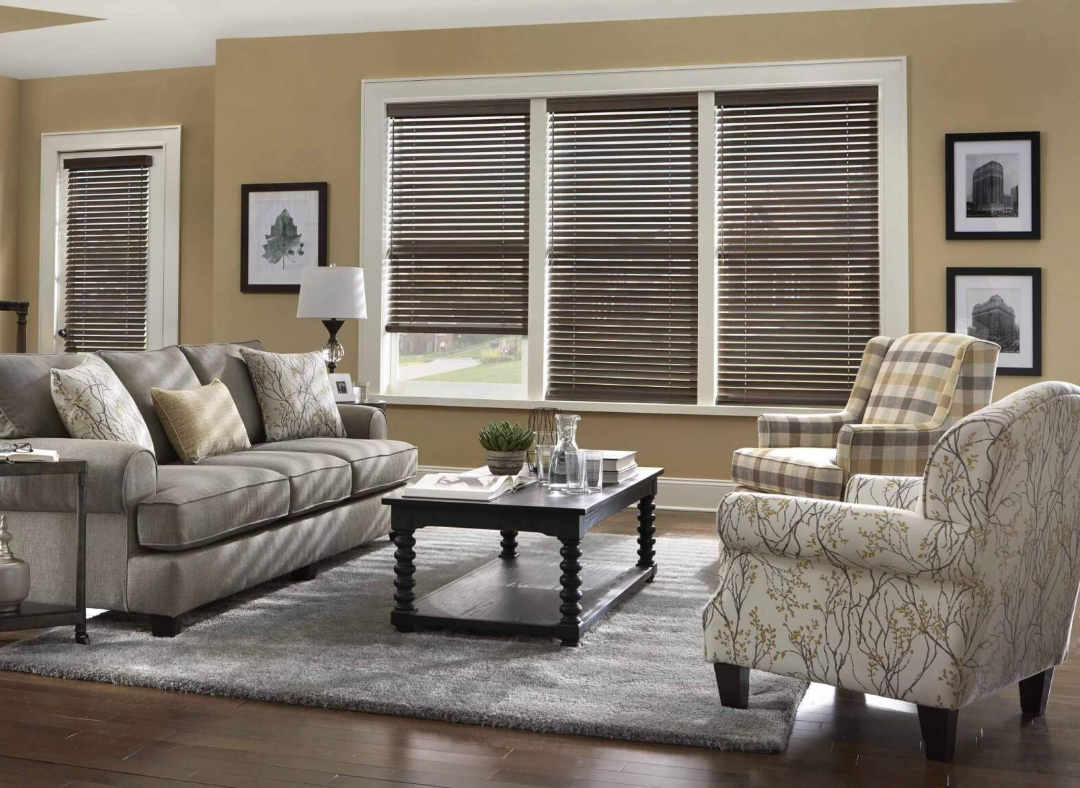 a living room with a couch , chairs , coffee table and  residential window blind solutions Love is Blinds Georgia.