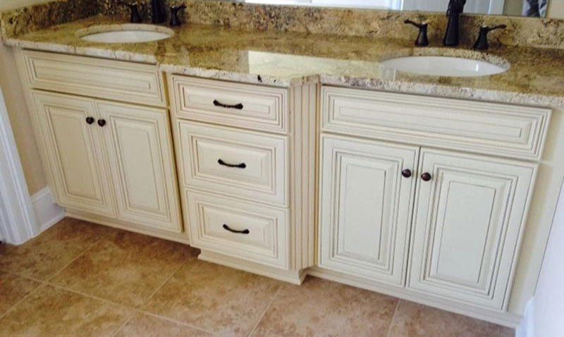 Custom Bathroom Cabinet Design — Elegant Bathroom with Marble Countertops in Matthews, NC