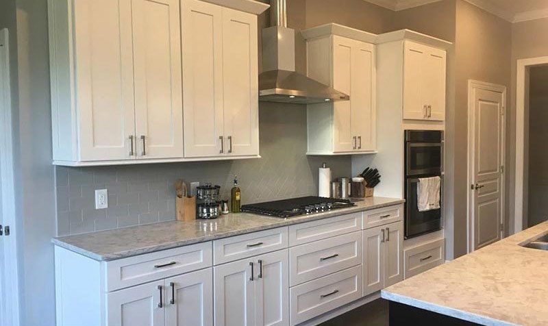 Custom Kitchen Design — Side View of Modern White-themed Kitchen in Matthews, NC