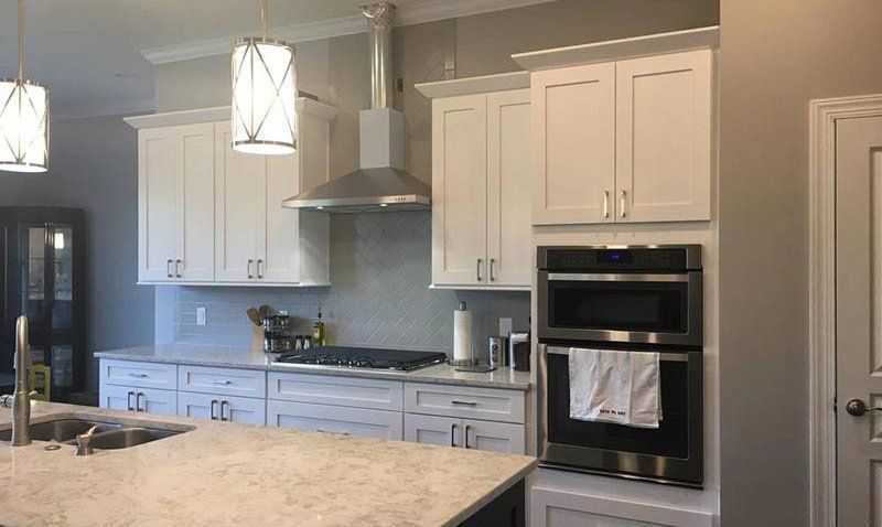 New Custom Kitchen—  Opposite Side View of Modern White-themed Kitchen in Matthews, NC