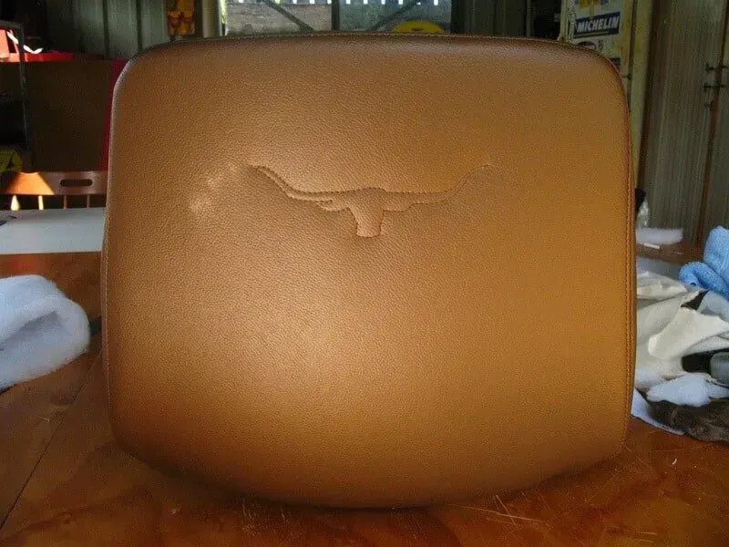 A Brown Item With a Longhorn on It — Paulie's Upholstery in Palm Cove, QLD