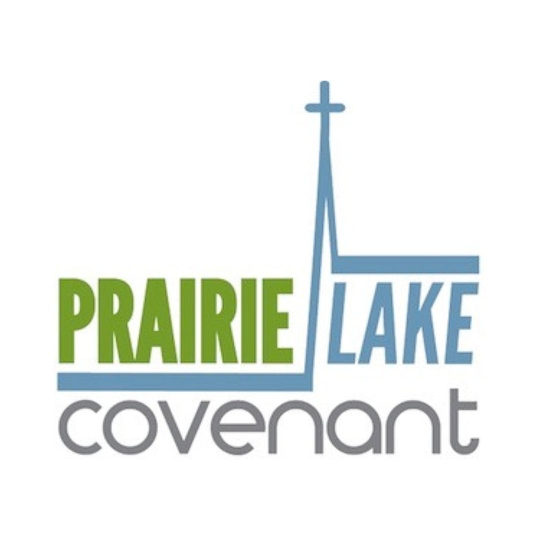 A cross is sitting on top of a green and blue wave.