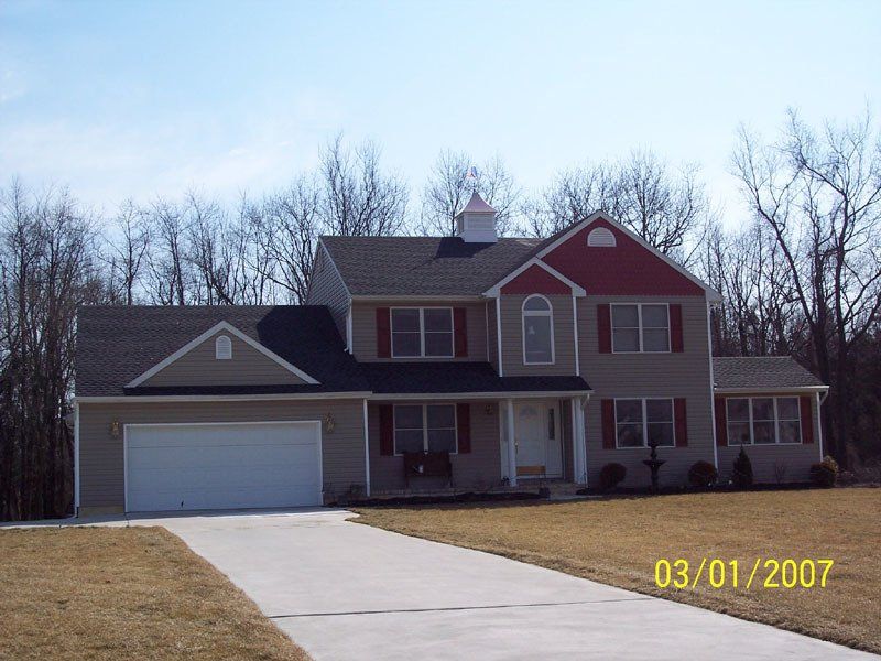 A picture of a house was taken on 03/01/2007