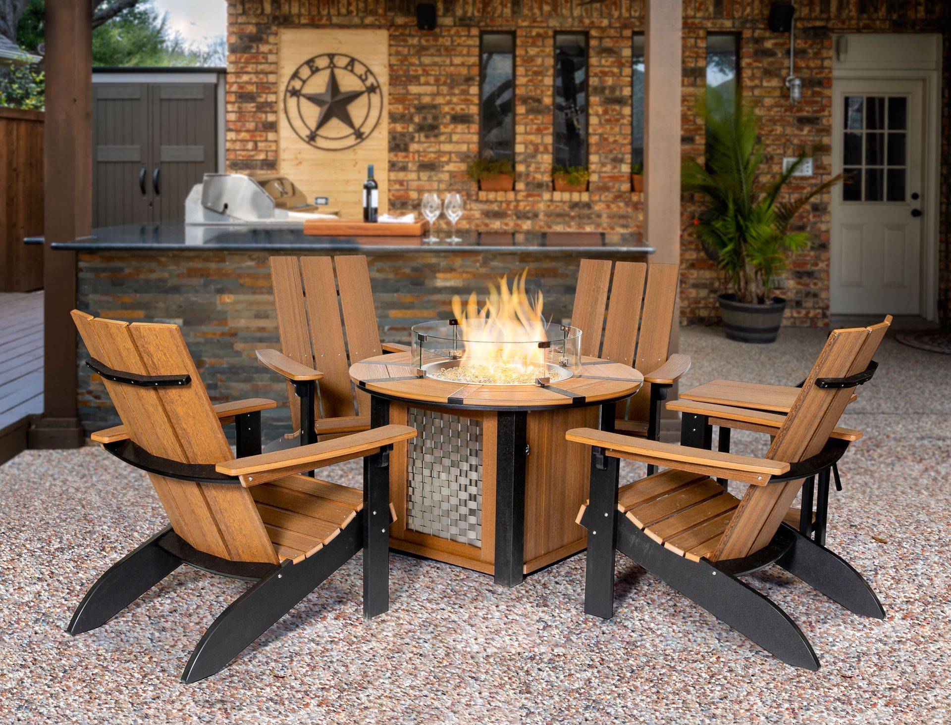 There is a fire pit in the middle of the patio.
