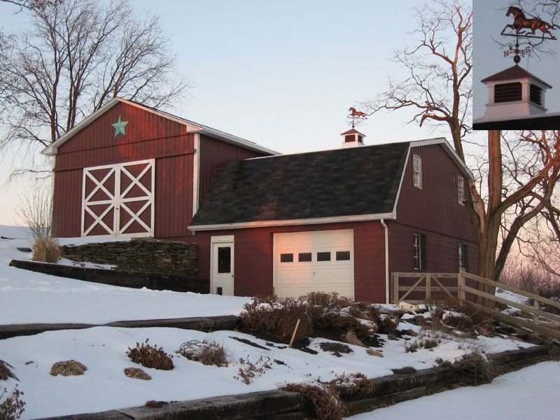 A red barn with a white star on the top