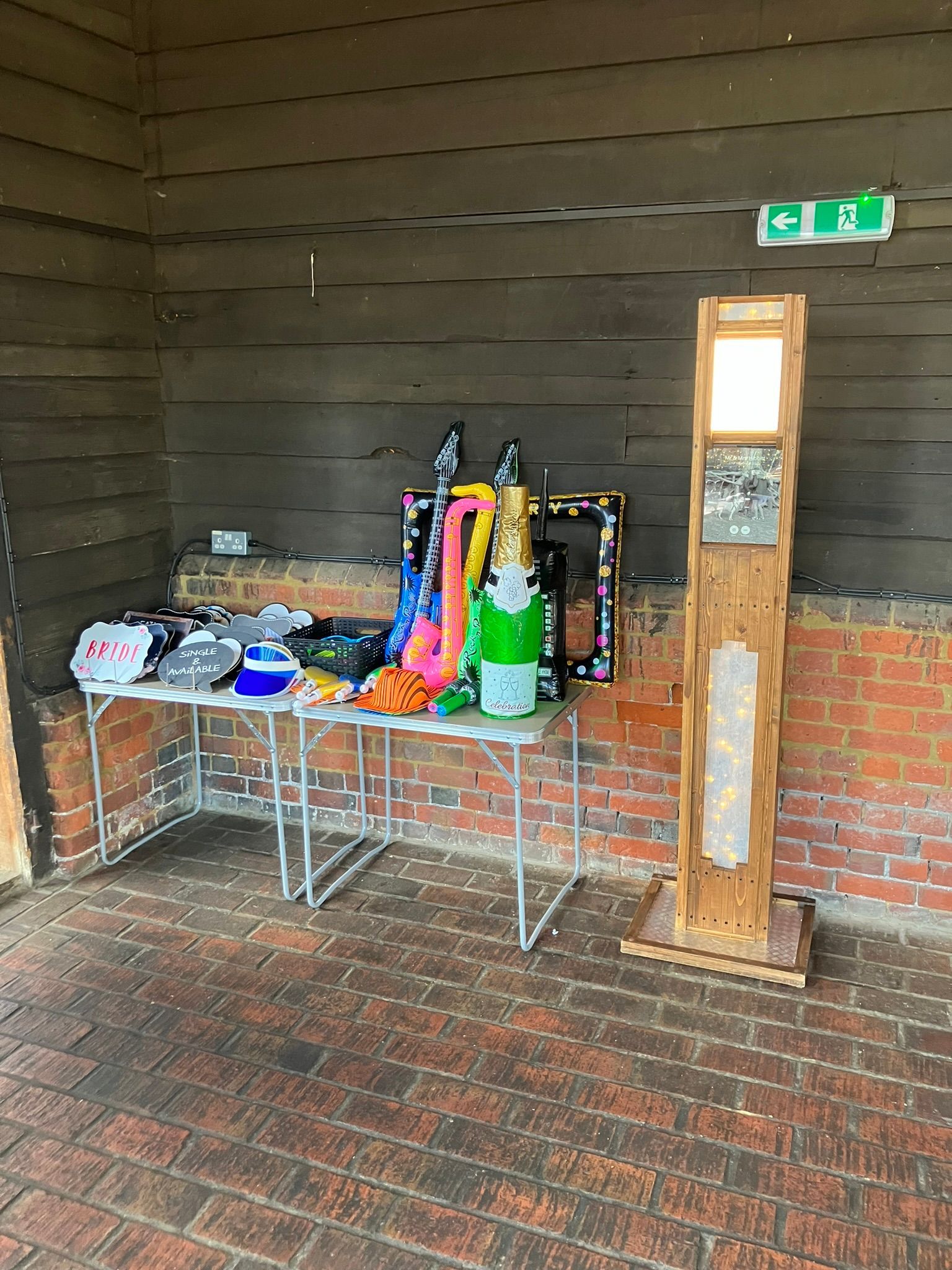 Selfie pod and props table for a wedding
