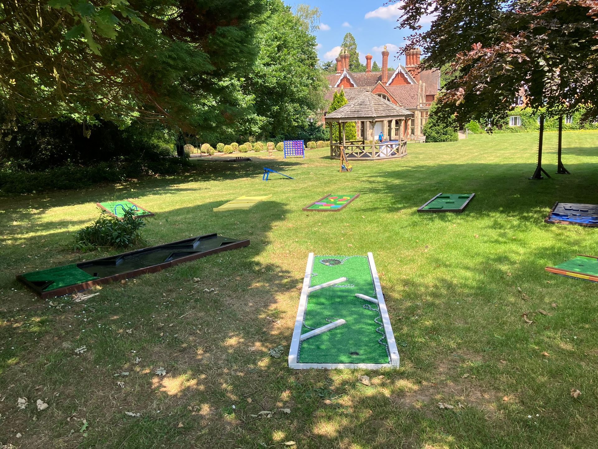 Mini Golf set up behind a hotel on a grassed area.