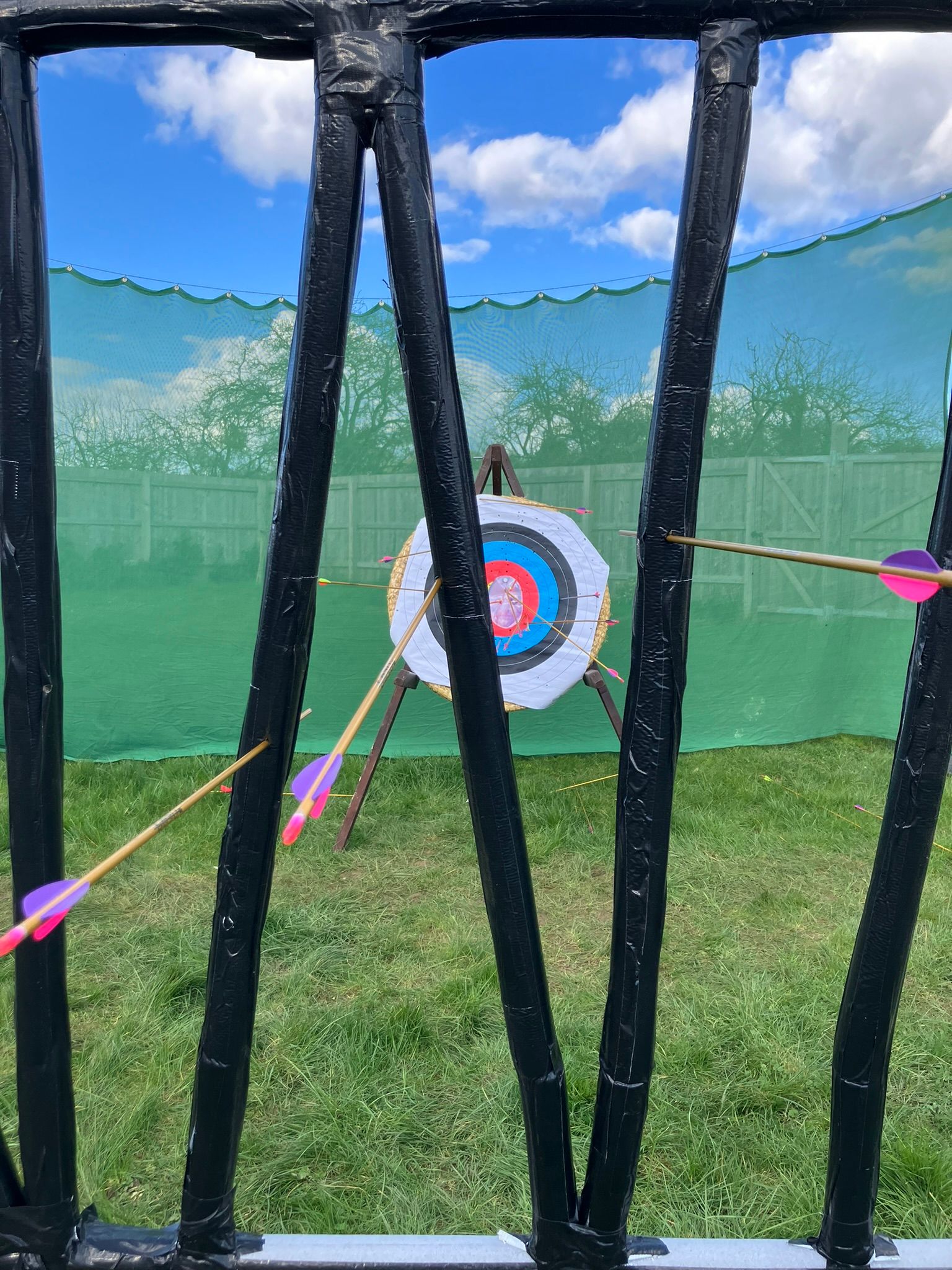 Field archery set up in a sports hall.