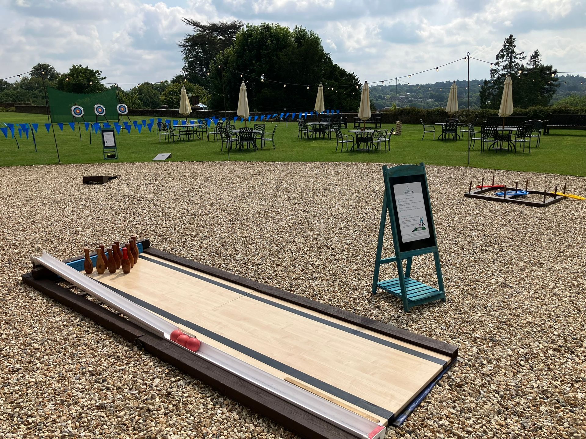 Wooden skittle alley on gravel