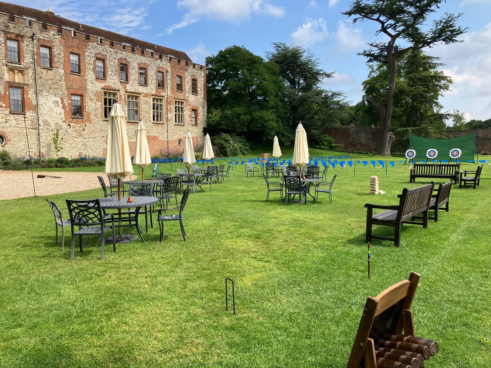 Corporate axe throwing and archery set up at Farnham Castle