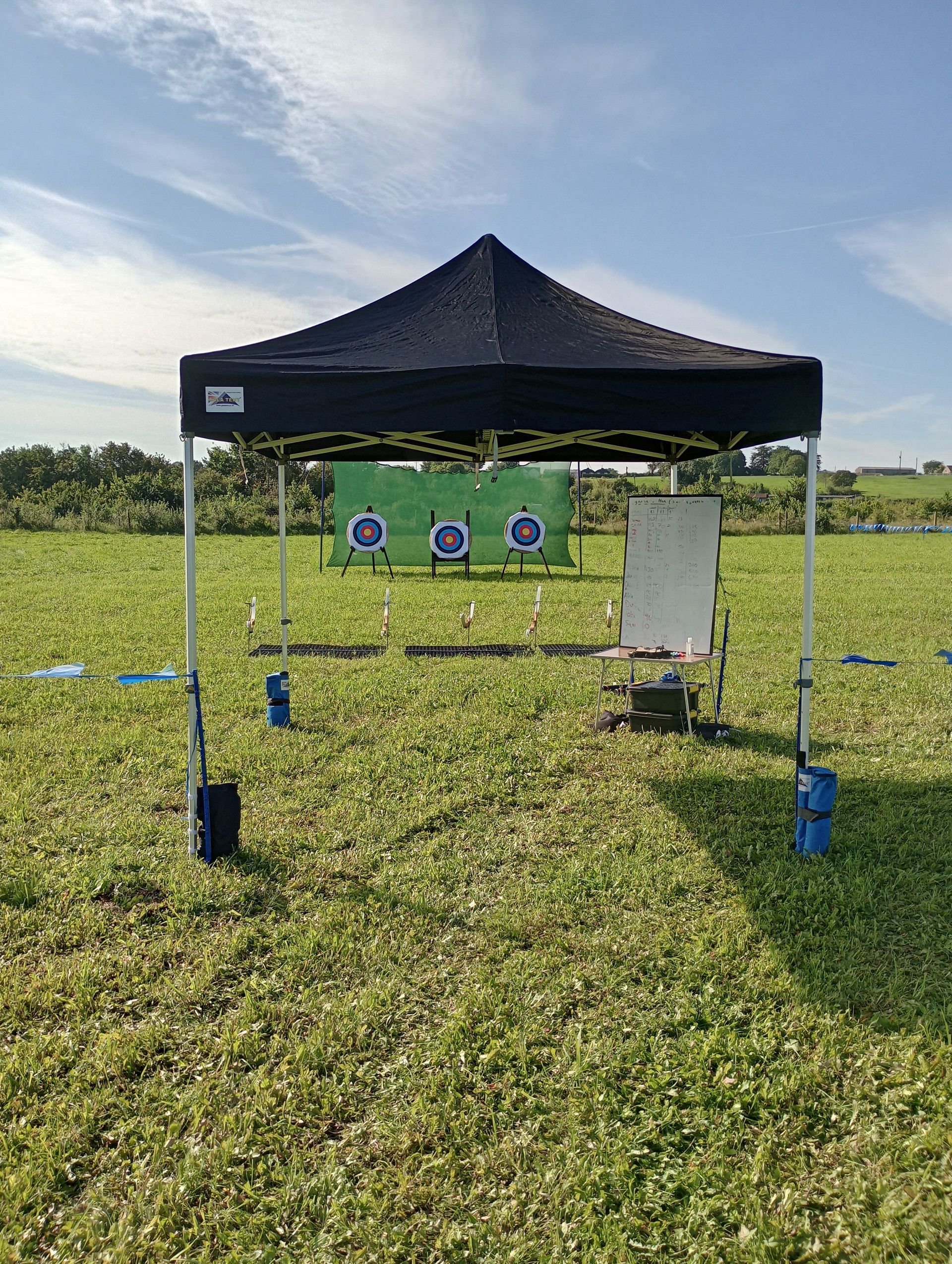 3 archery target set up for a family event.