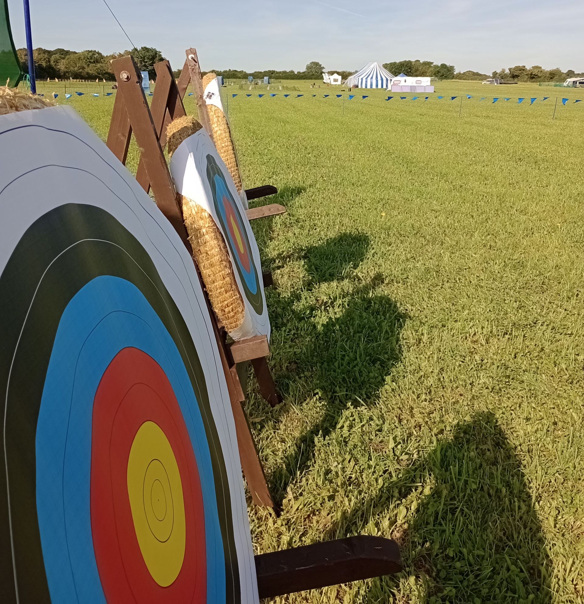 3 archery targets on a field for a family fun activity hire session.