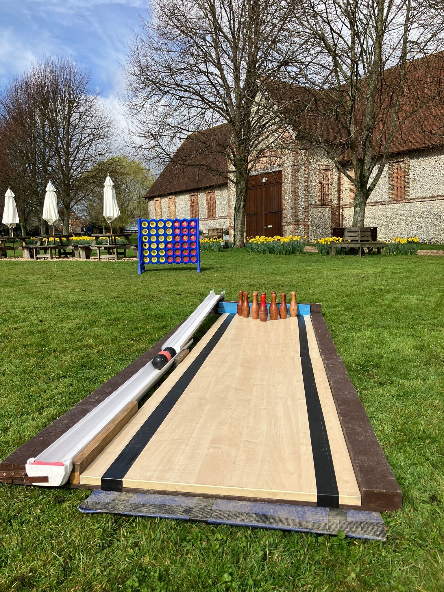Lawn games set up on grass for a wedding in Hampshire