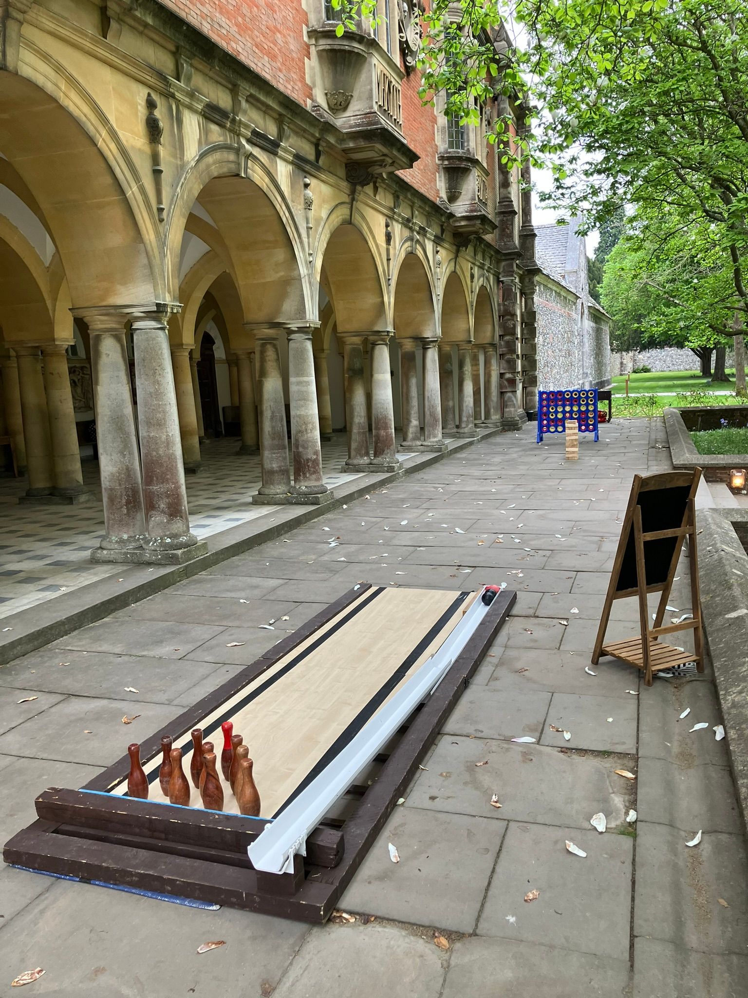 Lawn games set up on concrete for a corporate party in Hampshire