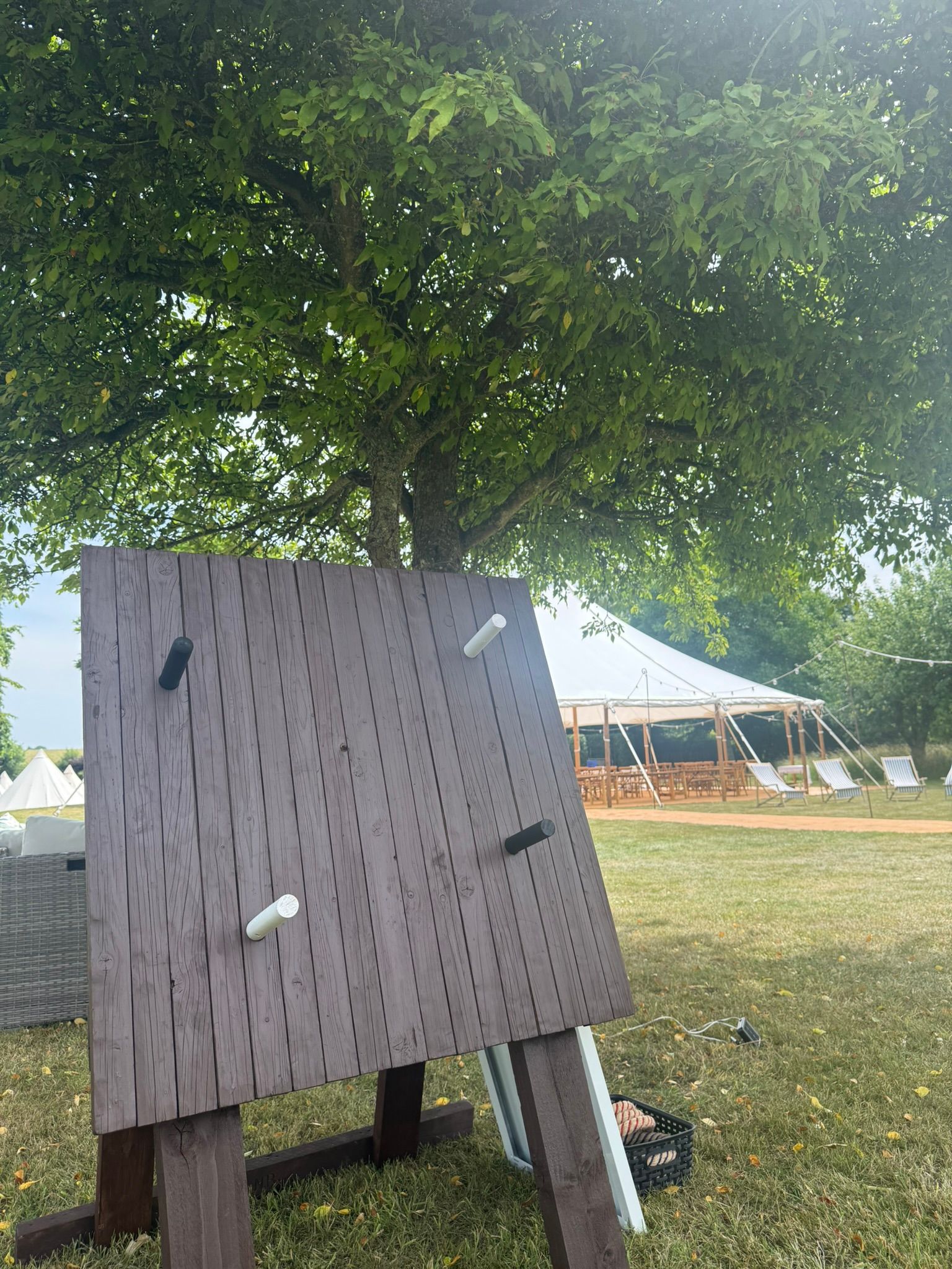 Various lawn games in a room for a birthday party