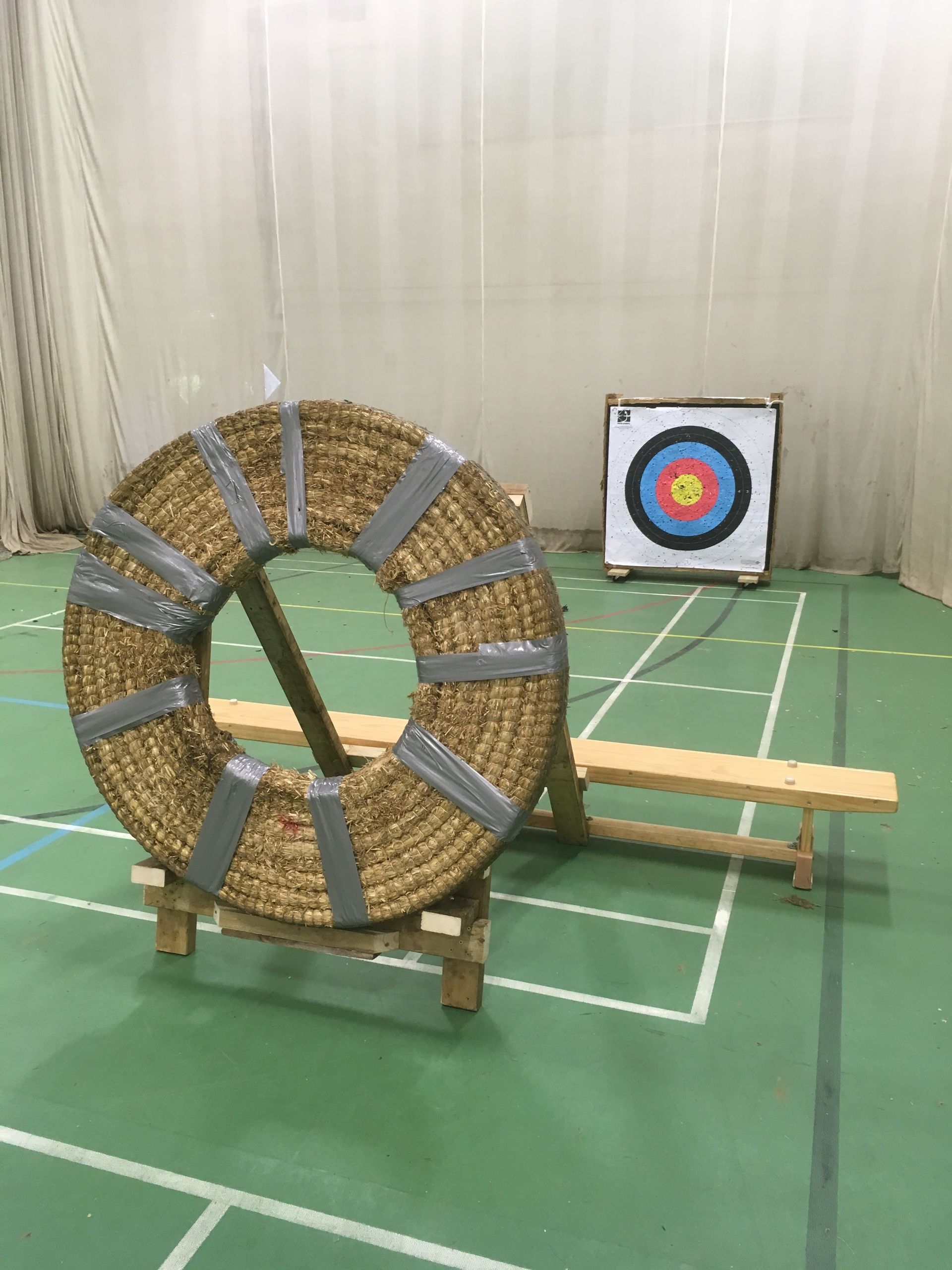 Field archery set up in a sports hall.
