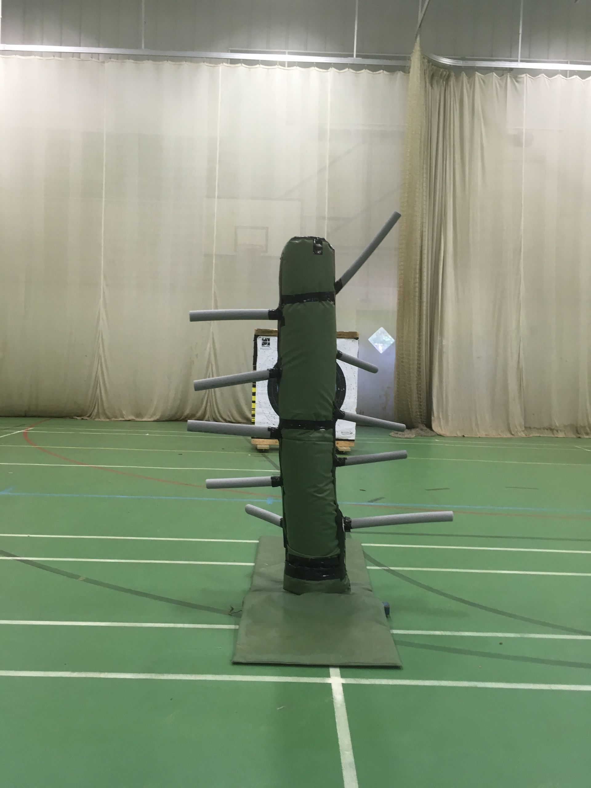 Field archery set up in a sports hall.