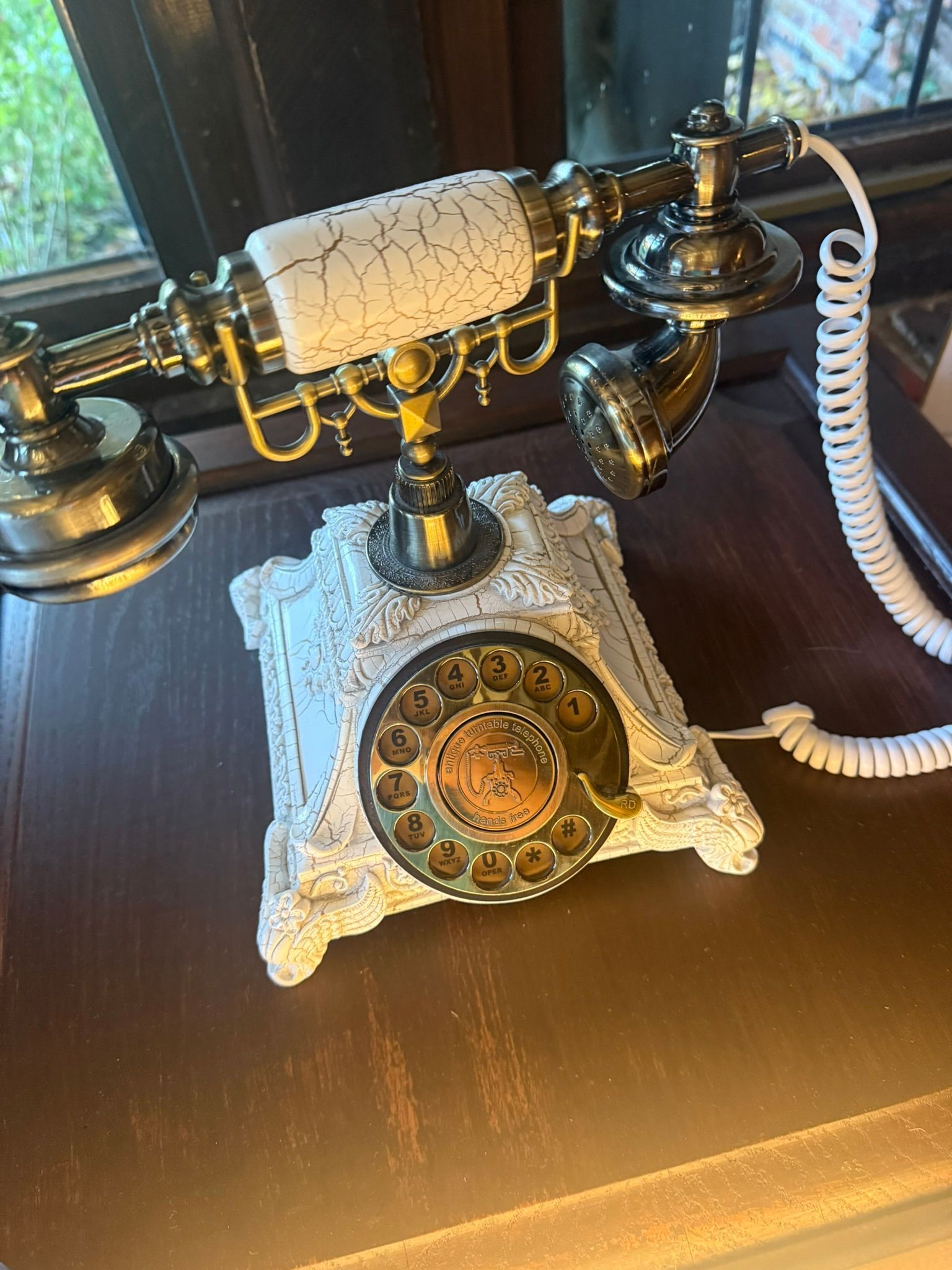 4 foot tall white light up LOVE letters in a wedding room with people dancing and people sat on chairs
