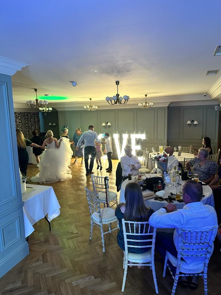 LOVE lights for a wedding at the Queens Hotel Portsmouth with the bride and others dancing.