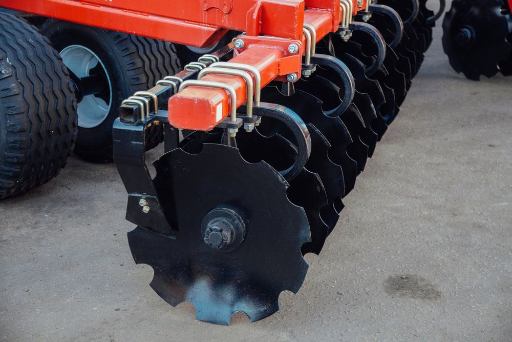 A Close Up of a Disc Harrow on a Tractor — Ken Mills Machinery in Kingaroy, QLD