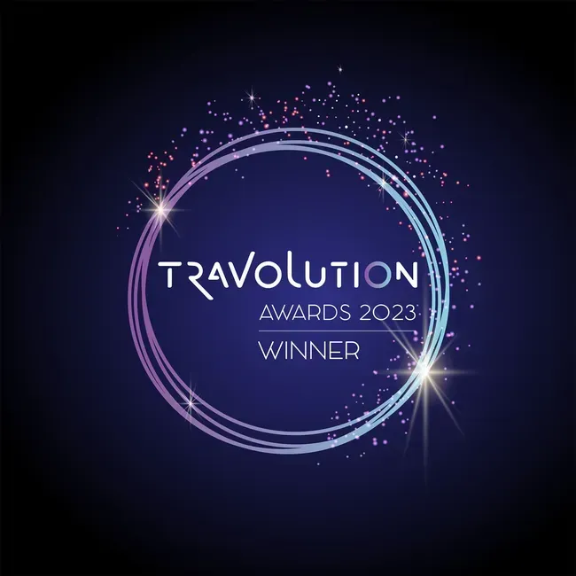 A logo for the travolution awards 2023 winner