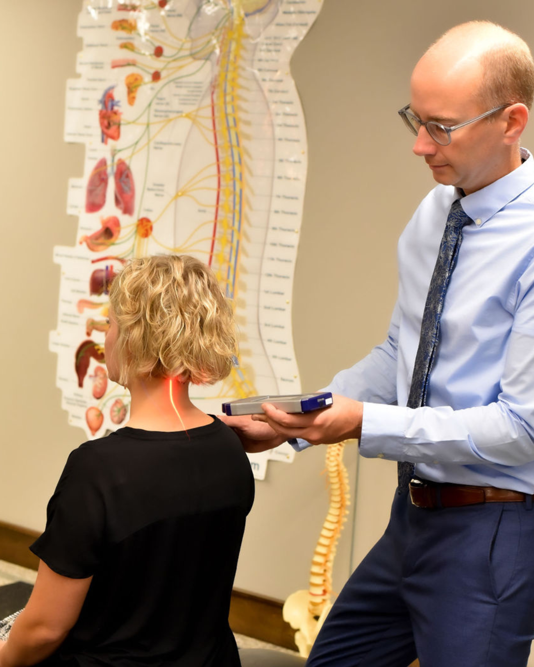 woman receiving laser therapy