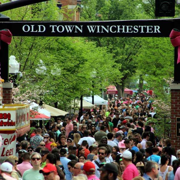 Crowd of people walking under an