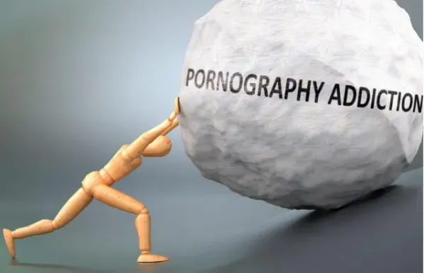 illustrated person pushing a large boulder labeled "pornography" up a hill