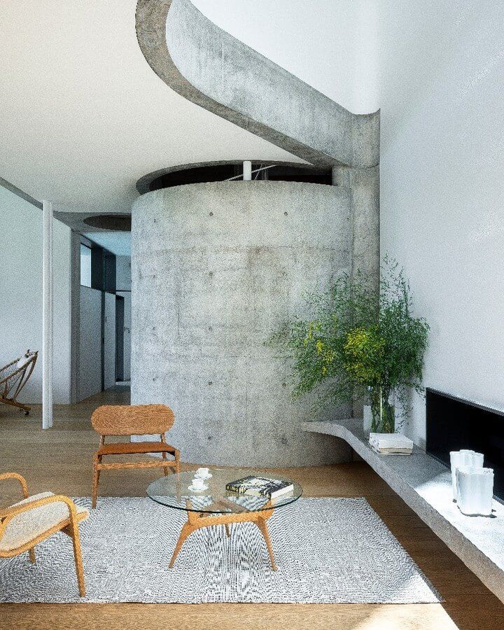 A Living Room With a Concrete Wall and a Table and Chairs — Vale Building Inspections in Forresters Beach, NSW