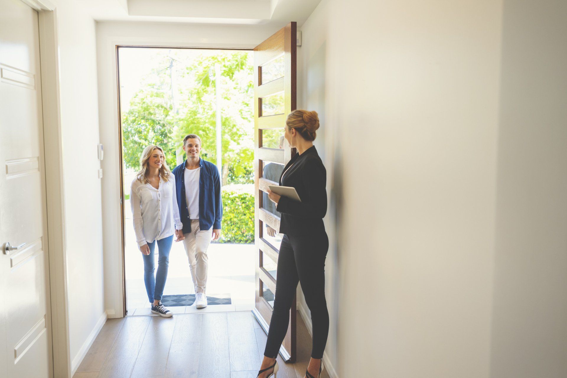 realtor showing house to couple