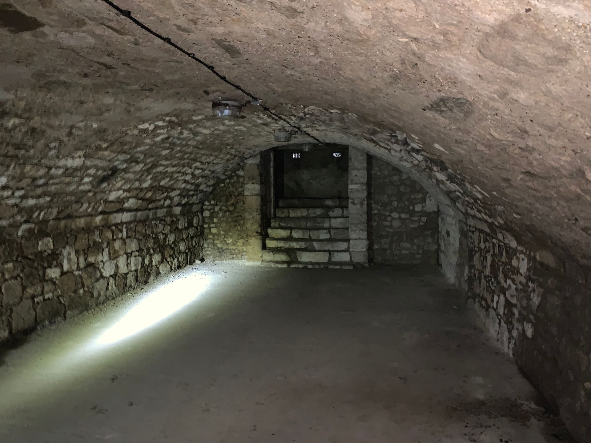 There is a light in the middle of the tunnel.