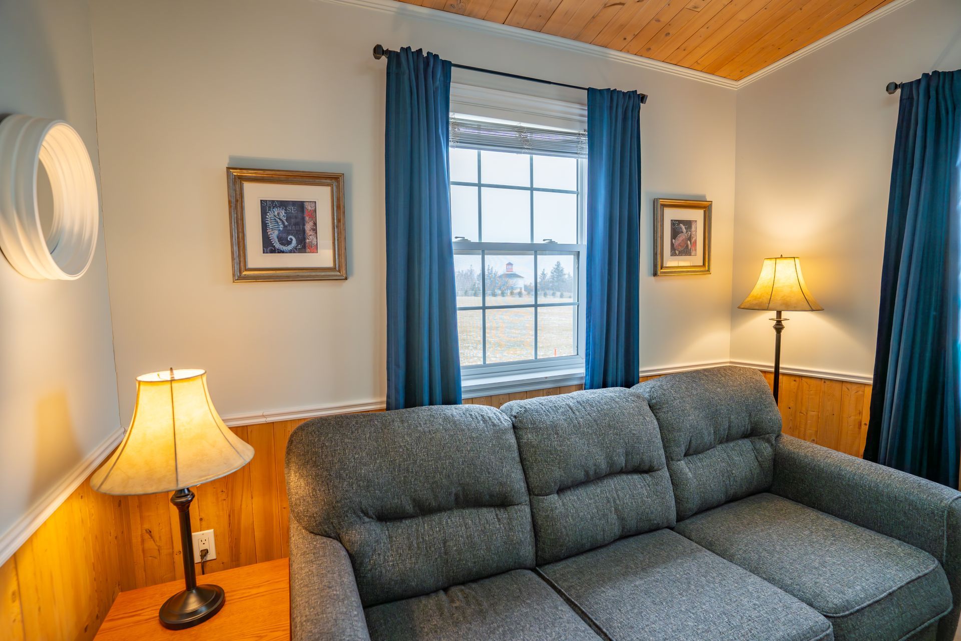 living area with windows over looking the bay of fundy